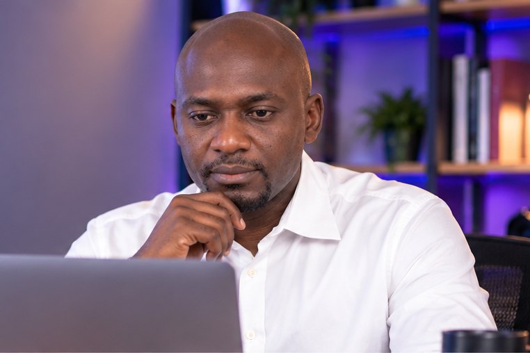 Davnai creator reviewing a video edit at a laptop